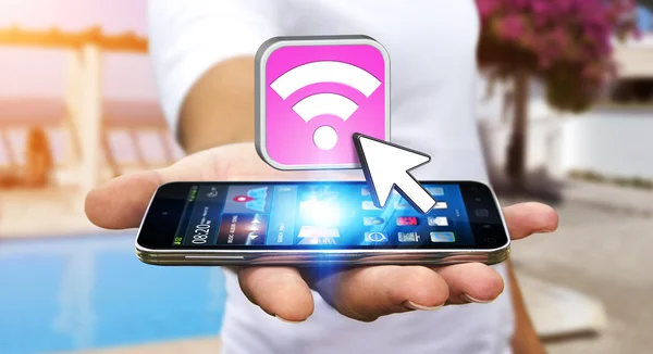 Ung man med modern mobil för att ansluta med wifi — Stockfoto