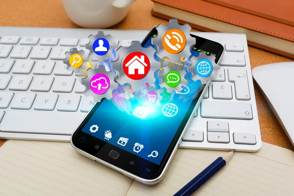 Modern cep telefonu ile cogwheels kutsal kişilerin resmi