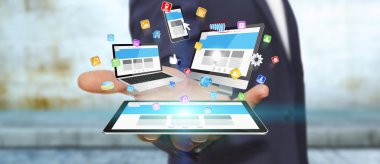 Teknik cihaz elinde tutan işadamı
