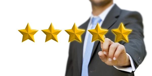 Young man rating stars — Stock Photo, Image