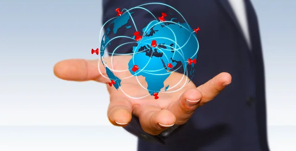 Businessman holding digital world map in his hands — Stock Photo, Image