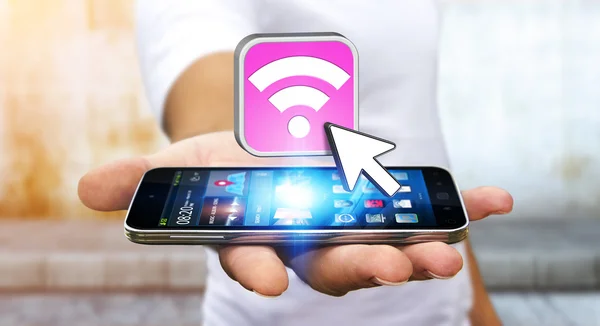 Ung man med modern mobil för att ansluta med wifi — Stockfoto