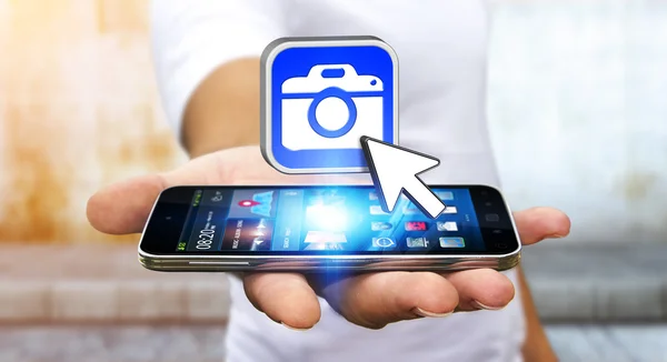 Young man using modern camera application — Stock Photo, Image