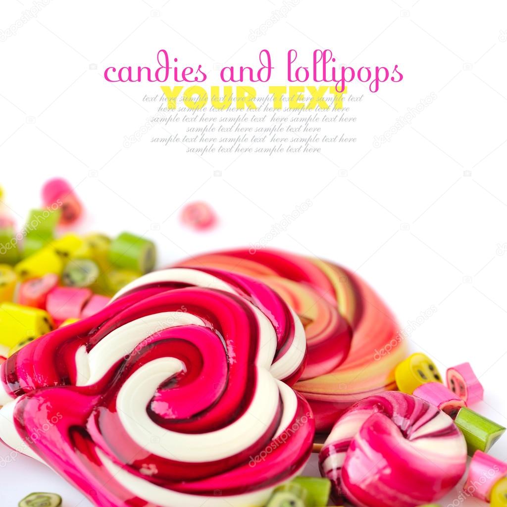 Colorful candies and lollipops on a white background