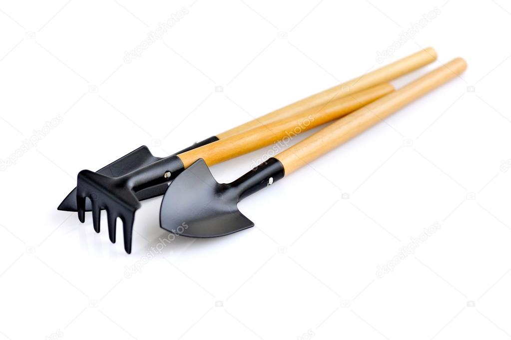 A set of garden tools for plant care on white background