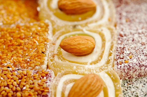 Delicious Turkish sweets with almonds — Stock Photo, Image
