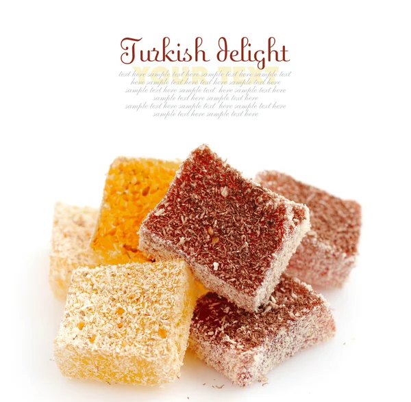 Sweet pieces of turkish delight on white background — Stock Photo, Image