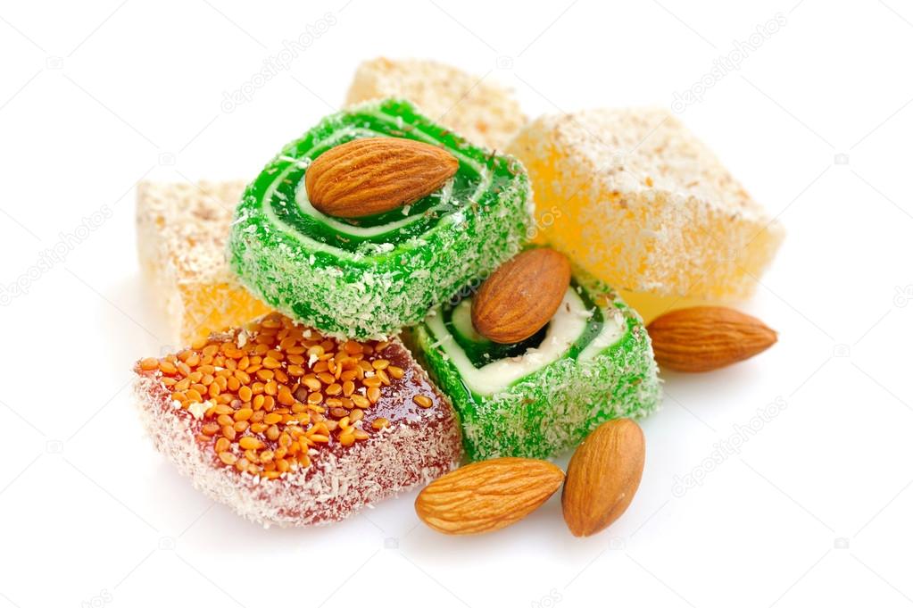 Tasty Turkish delight with almond isolated on white background