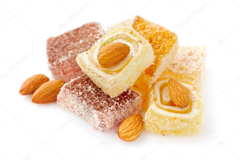 Tasty Turkish delight with almond isolated on white background
