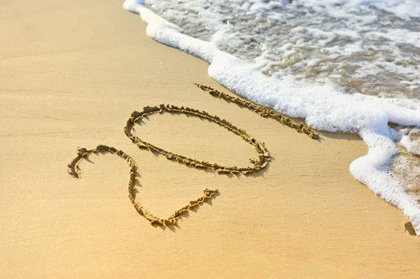 New year 2015 written on sand — Stock Photo, Image