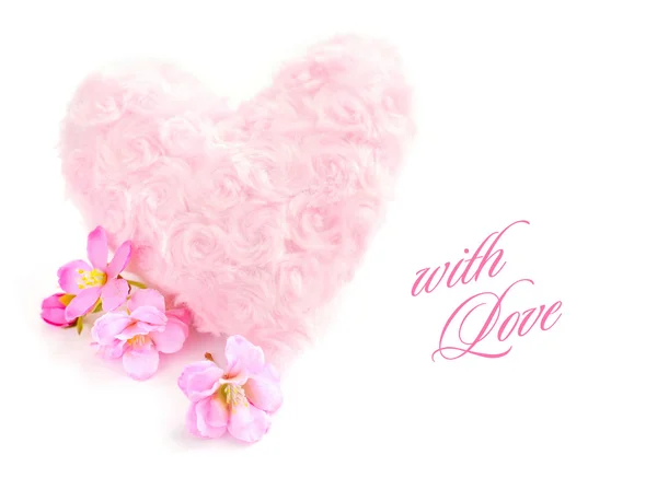 Fur pink heart with a pink flowers on white background — Stock Photo, Image