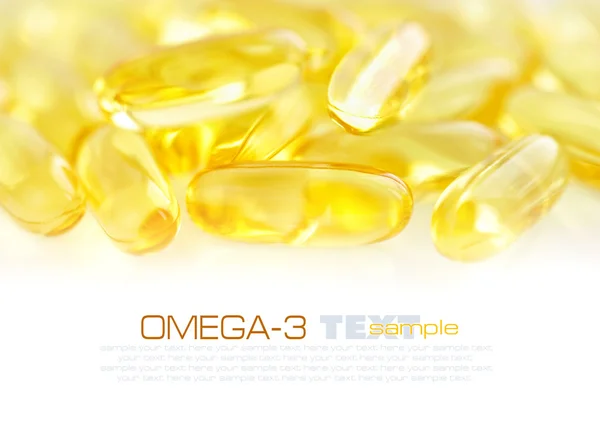 Cápsulas Omega-3 sobre fundo branco — Fotografia de Stock