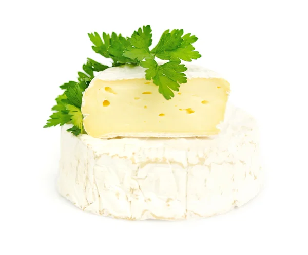 Camembert kaas met een peterselie geïsoleerd op wit — Stockfoto