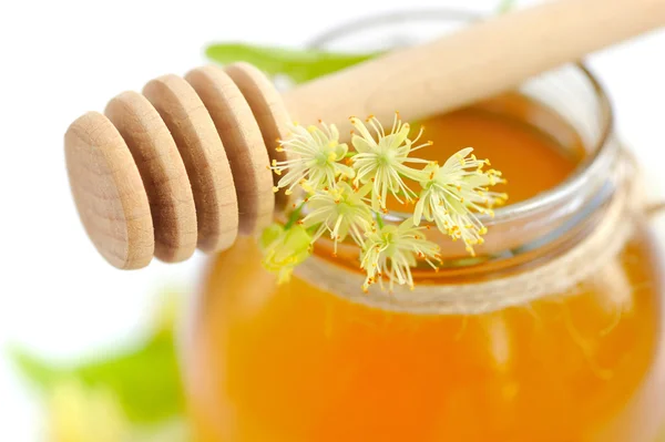 Fresh honey with flowers of linden — Stock Photo, Image