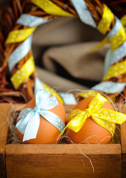 Easter eggs in wooden box — Stock Photo, Image