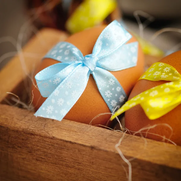 Easter eggs in wooden box — Stock Photo, Image