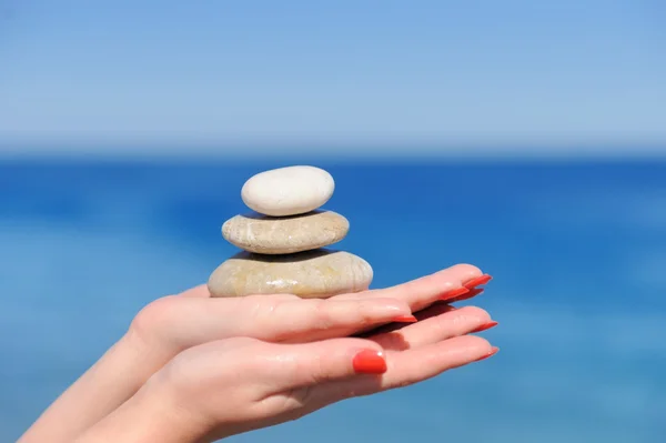 Piedras en una mano — Foto de Stock