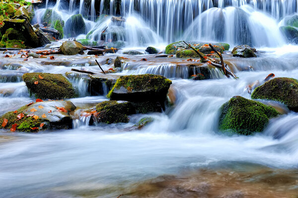 Waterfall in the autumn forest