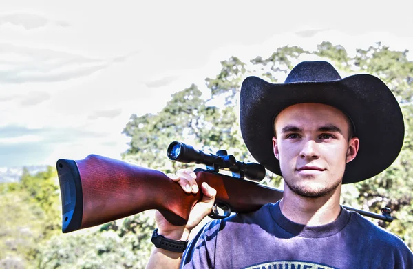 Muž s puškou — Stock fotografie
