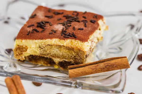 Tiramisu Cake with coffee beans and cinnamon — Stock Photo, Image