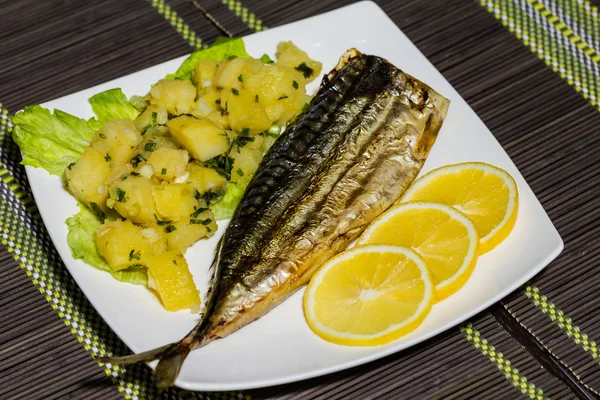 Fresh mackerel fillet with boiled potato and lemon