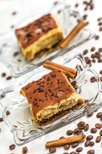 Tiramisu Cake with coffee beans and cinnamon — Stock Photo, Image