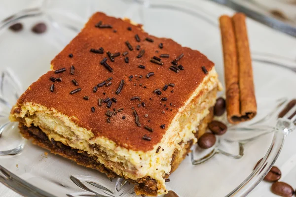 Tiramisu Cake with coffee beans and cinnamon — Stock Photo, Image