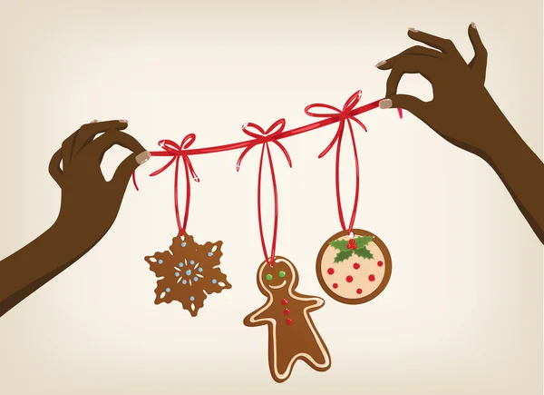 Mãos afro segurando uma grinalda de Natal com biscoitos — Vetor de Stock