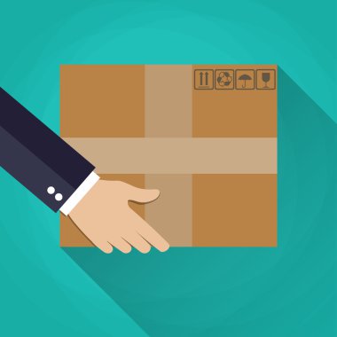 Hand carrying a cardboard box. clipart