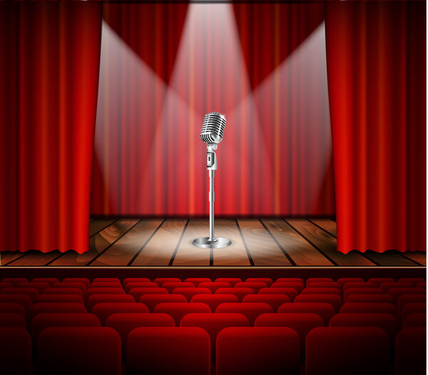 Микрофон и красный занавес

