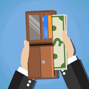 insan açılan cüzdan içine nakit dolar koyarak