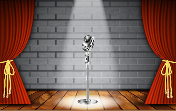 Микрофон и красный занавес
