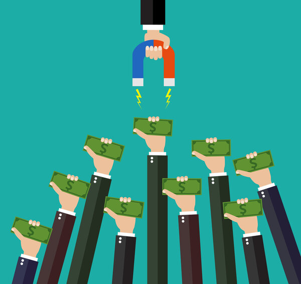 Businessman holding magnet