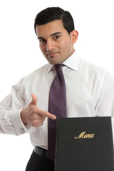 Hombre con un menú u otro libro — Foto de Stock