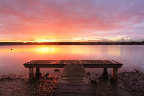 Australan západu slunce v Green Point jetty Austrálie — Stock fotografie