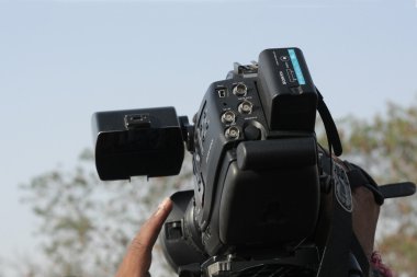 Hint kameramanların bir olay ateş etmek Video kamera kullanmak 