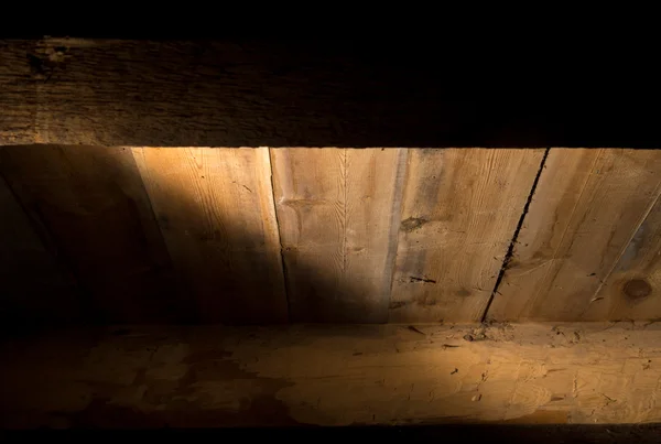 Μια ακτίνα φωτός στο ξύλινο φόντο — Φωτογραφία Αρχείου