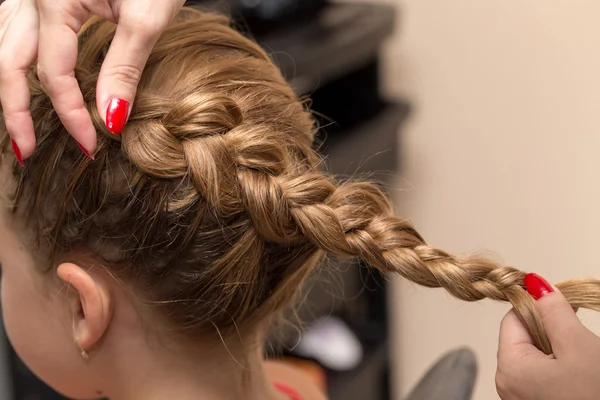 Braided pigtails in the beauty salon — Stock Photo, Image