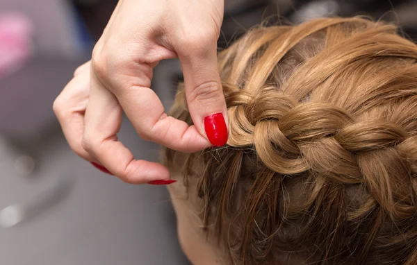 Braided pigtails in the beauty salon — Stock Photo, Image