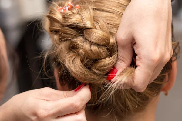 Braided pigtails in the beauty salon — Stock Photo, Image