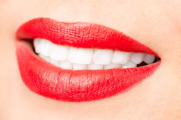 Beautiful lips with red lipstick Stock Image