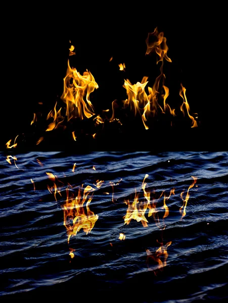 Lågan eld med reflektion i vatten — Stockfoto