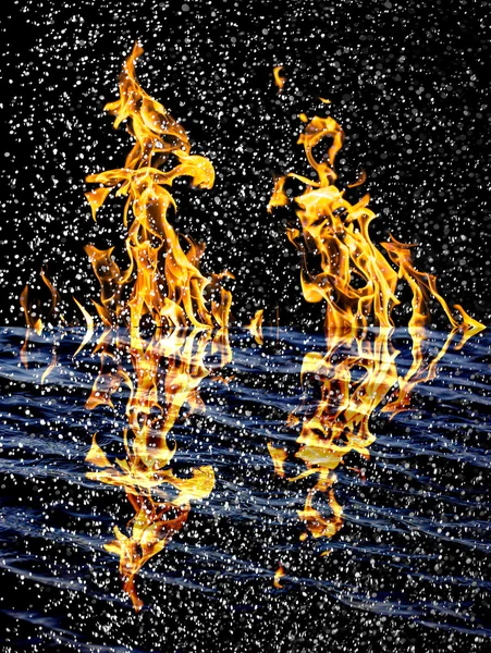 Snow on the fire background with reflection on water — Stock Photo, Image