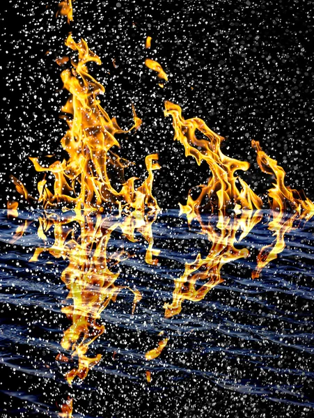 Snow on the fire background with reflection on water — Stock Photo, Image