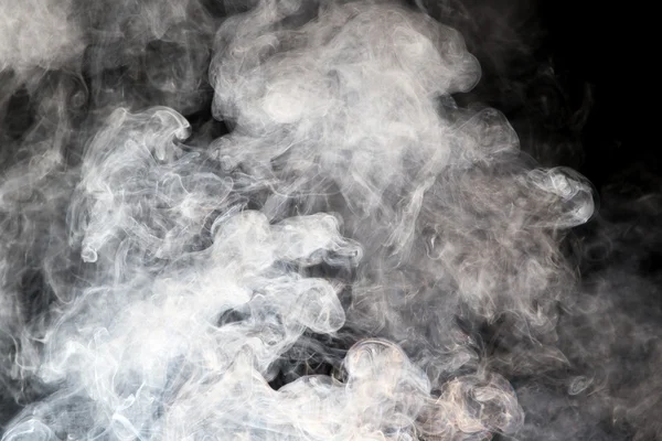 Humo sobre fondo negro — Foto de Stock