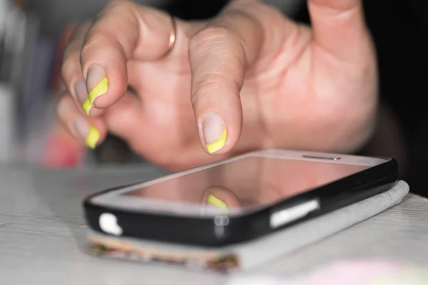 Cell phone in hand — Stock Photo, Image