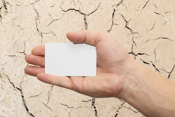 Cartão branco na mão — Fotografia de Stock