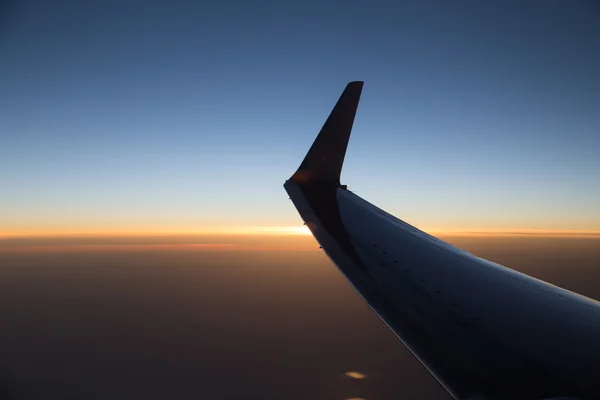 Wing aircraft at sunset — Stock Photo, Image