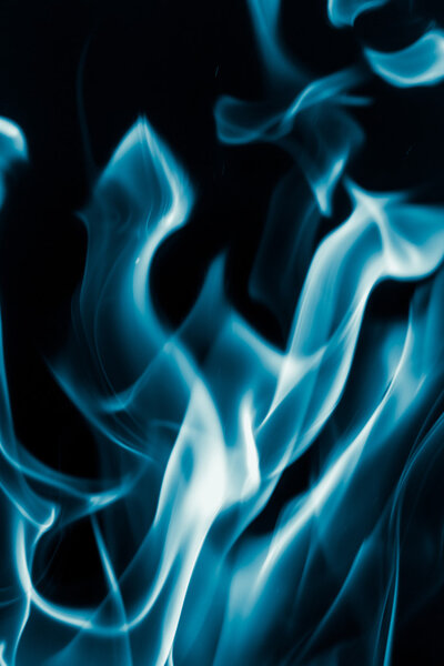 Blue flame fire on a black background
