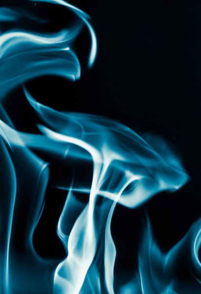 Blue flame fire on a black background